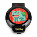 Uncanny Brands Pokémon Bulbasaur waffle maker with a black non-stick lid and colorful character art.