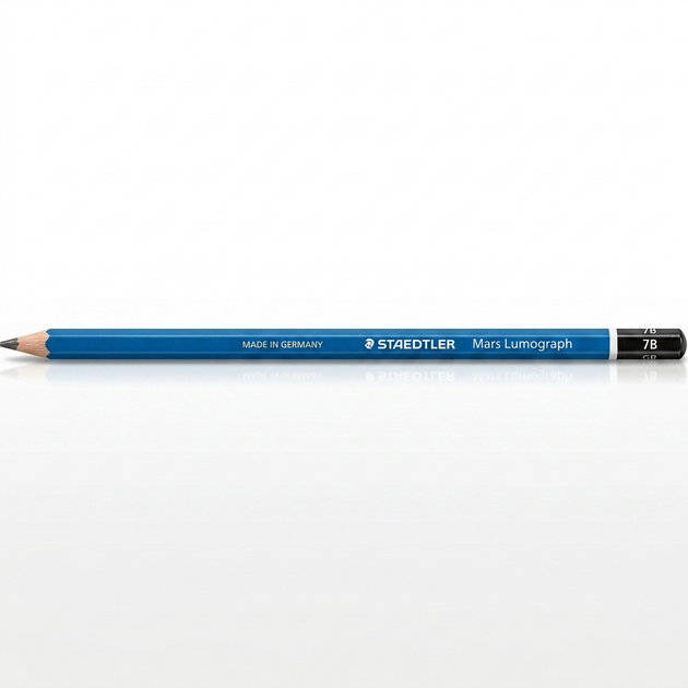 High-resolution hero shot of a single STAEDTLER Mars Lumograph 7B pencil.
