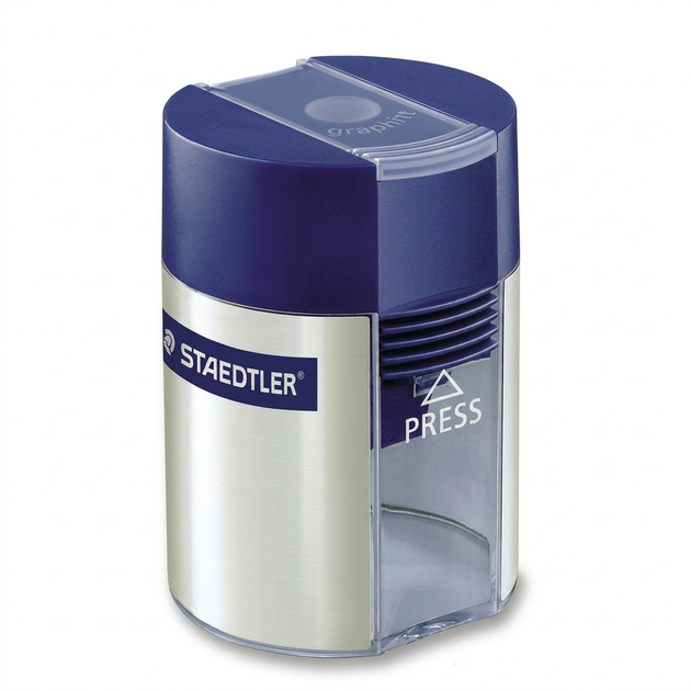 A high-resolution product shot of the STAEDTLER 511-001-A602 metal sharpener and waste container.