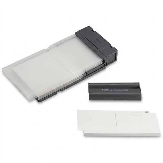 A high-resolution, pure white background studio photograph of the Canon KP-36IP ink and paper set.