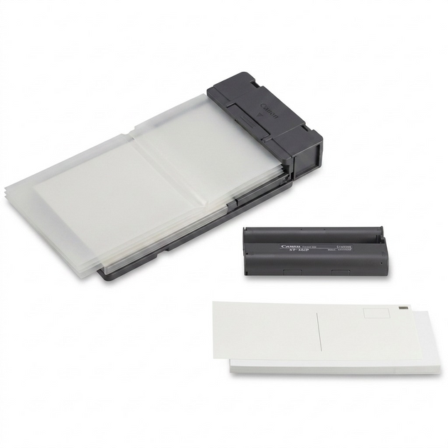 A high-resolution, pure white background studio photograph of the Canon KP-36IP ink and paper set.