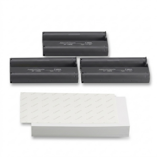 A close-up photograph of three grey rectangular toner cartridges.