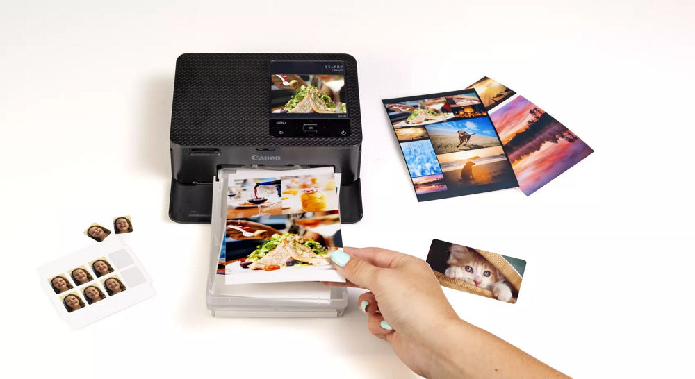 SELPHY CP1500 Printing and surrounded by other printed images