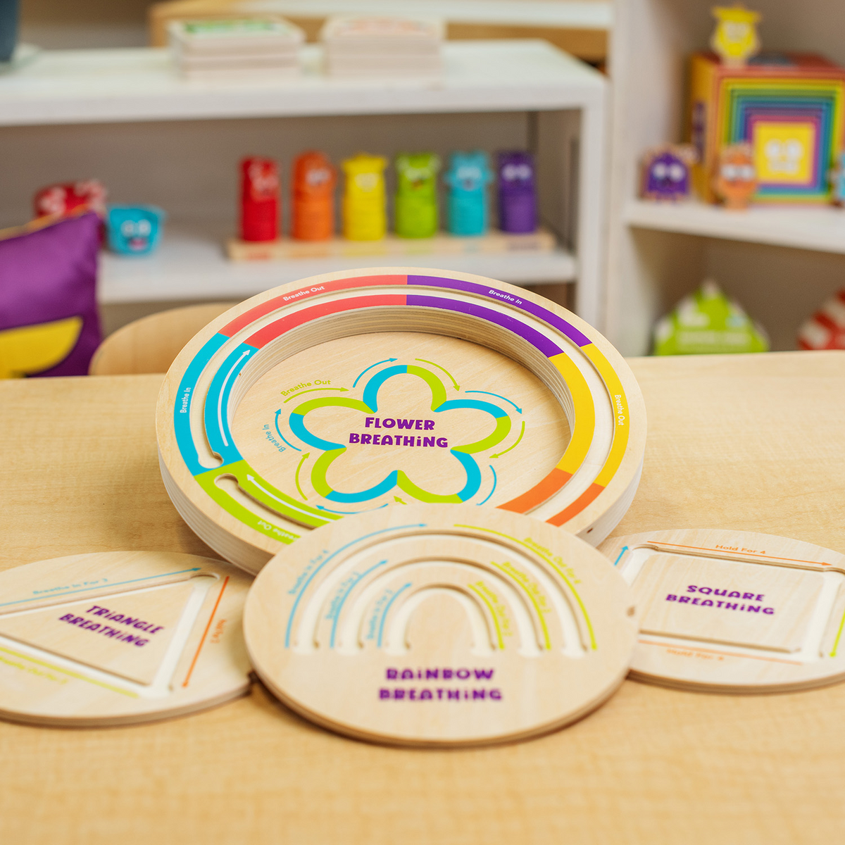 Calming Breathing Boards laid out on a table in a playroom