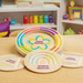 Calming Breathing Boards laid out on a table in a playroom