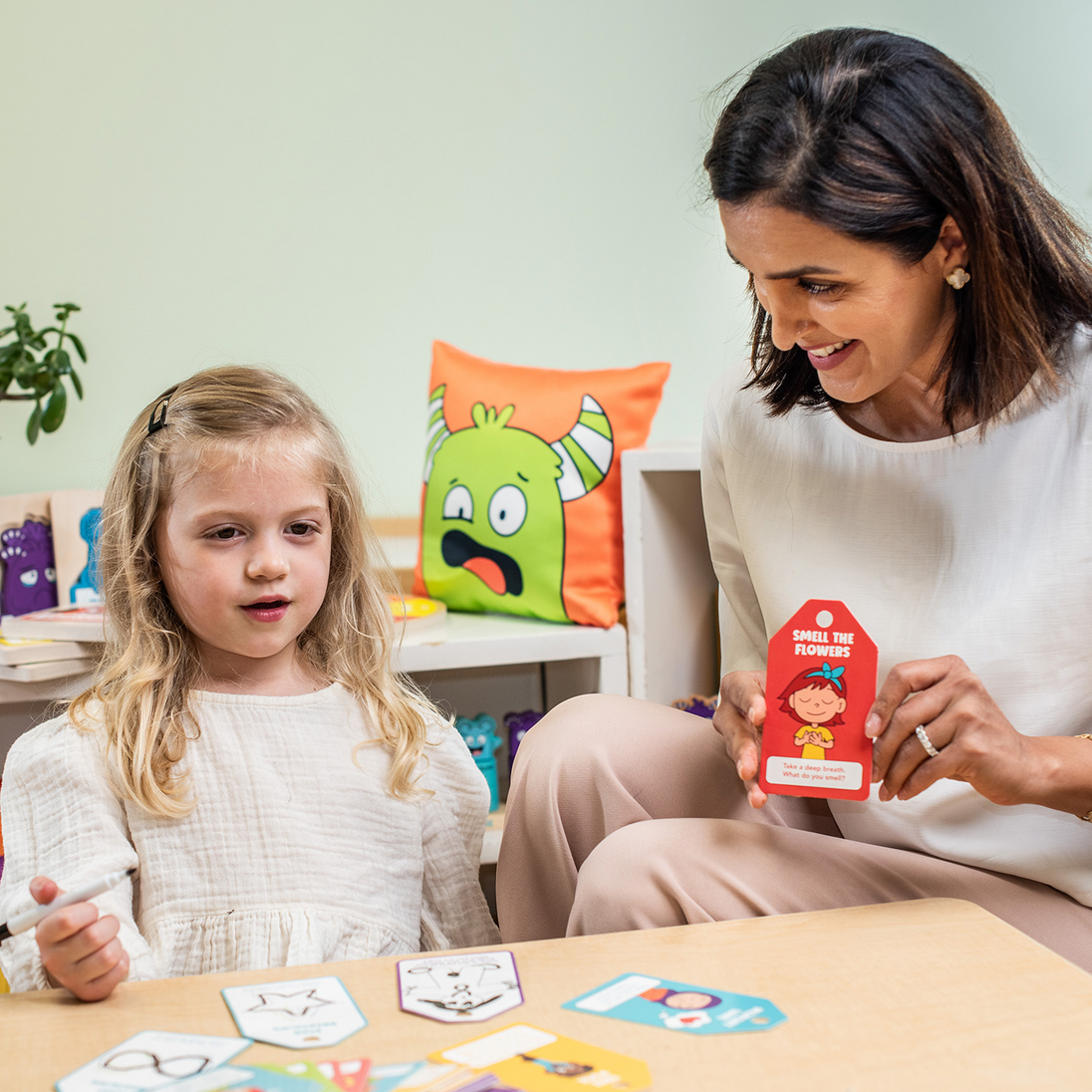 Mother and daughter using the Calming Cards together