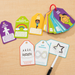 Calming Cards fanned out on their ring with the dry-erase marker
