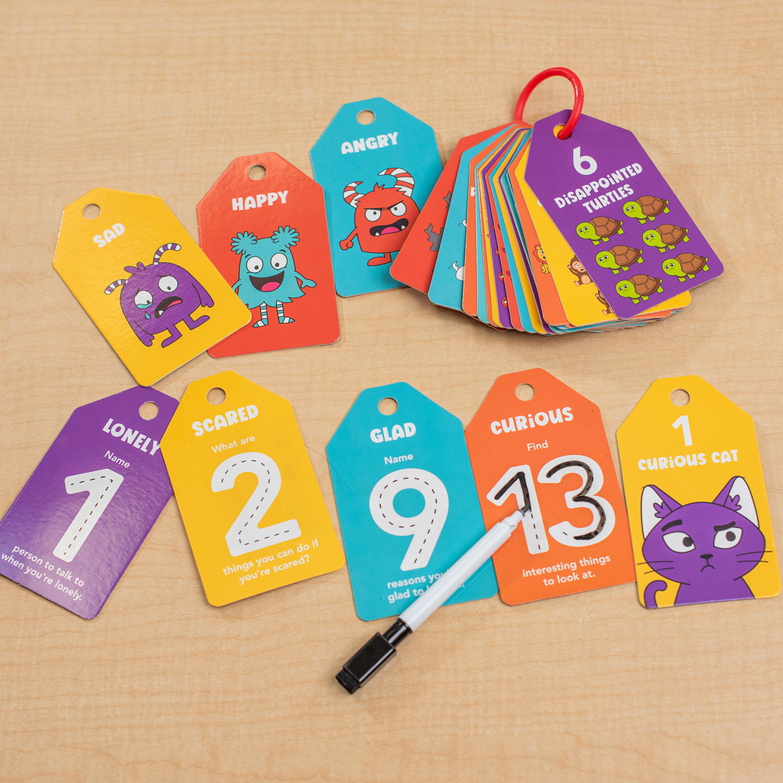 Emotions 123's number cards fanned out on their ring