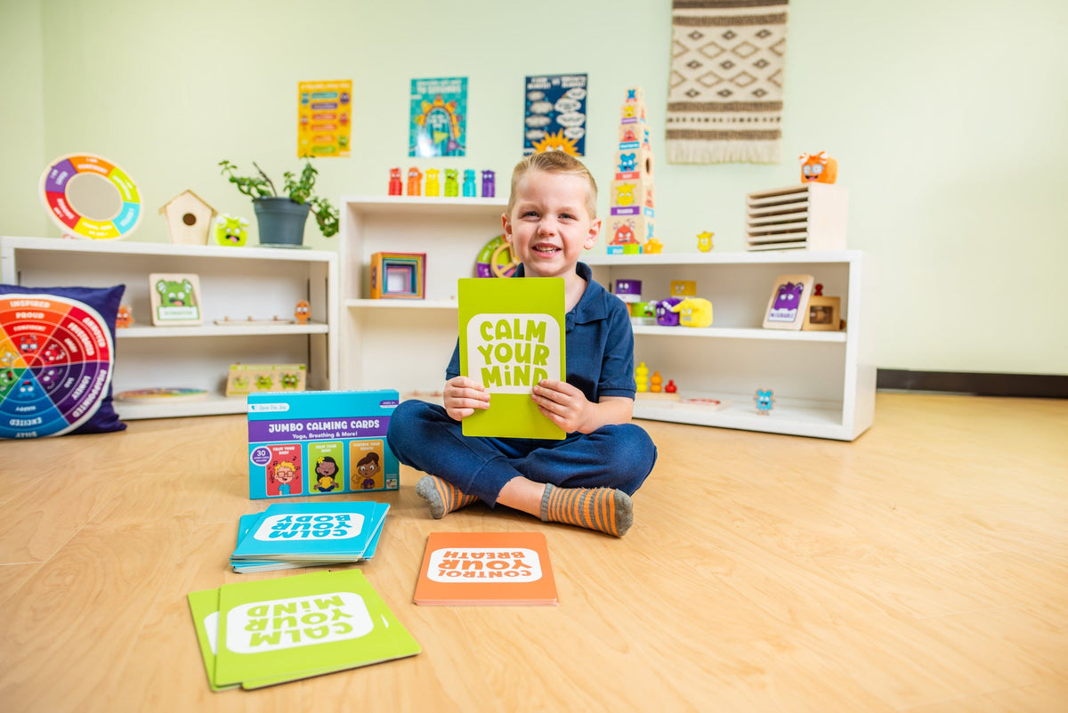 Teacher and child using the Jumbo Calming Cards in a classroom