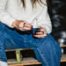 Close view of the Wicked Audio Mojo 800 charging case held in hand