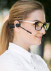 Woman wearing OPN Sound Chat Pro open-ear headset
