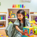 Girl playing with the Tower of Emotions blocks in a playroom