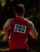 Race runner wearing OPN Sound Dashlyte+ headphones